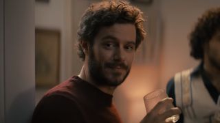 Adam Brody smiling at Kristen Bell in Nobody Wants This' first episode 