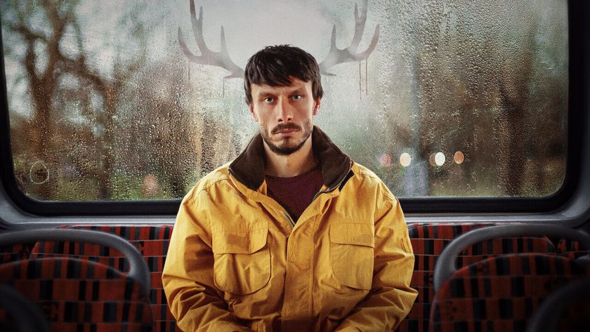 A promotional image for Netflix&#039;s Baby Reindeer, which shows Ricard Gadd sitting on the back seat of a bus