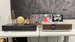 Ruark Audio R410 and Naim Mu-so 2 sitting on table in test room