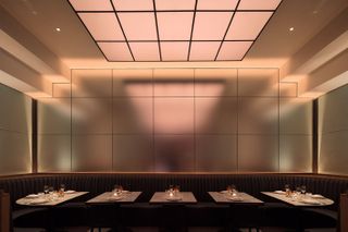 A large ceiling light in the dining area