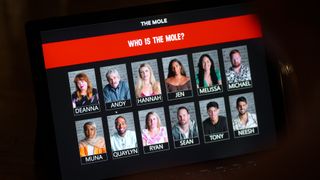 A still from &#039;The Mole&#039; season 2 showing the ten contestants on a laptop 