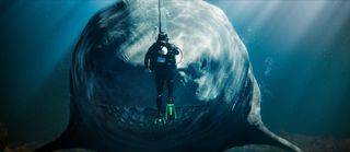 A diver stares down a Megalodon in Meg 2: The Trench 