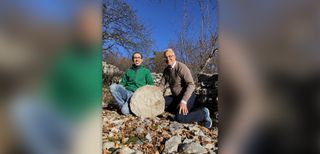 Archaeologist Federico Bernardini (left) and astronomer Paolo Molaro at the Castelliere di Rupinpiccolo near Trieste in northeastern Italy with a large stone map.