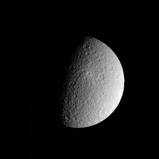 NASA's Cassini spacecraft took this raw, unprocessed image of Saturn's moon Rhea on March 10, 2012. The camera was pointing toward Rhea at 26,019 miles (41,873 kilometers) away.