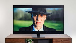 Samsung QN90D Neo QLED TV in living room showing a scene from Oppenheimer