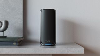 Netgear Orbi 970 router on counter