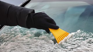 Plastic ice scraper