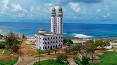 view of Dakar with mosque in foreground and sea in background