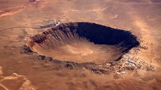 Barringer Crater is approximately 570 feet (174 meters) deep.