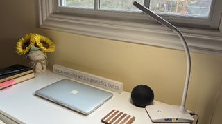 Echo Dot 5th Gen sits on white desk