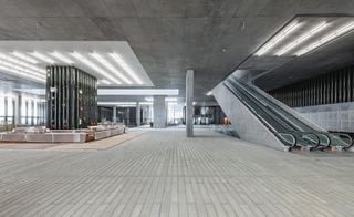 A giant podium with escalator