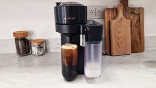 Nespresso Vertuo Lattissima next to a freshly made iced coffee