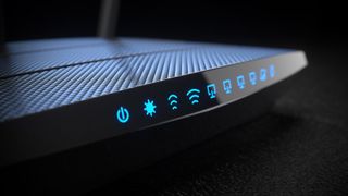 A close-up of a generic home Wi-Fi router.