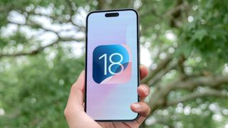 iOS 18 logo on an iPhone 15 Pro