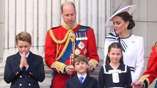 LONDON, ENGLAND - JUNE 15: Prince George of Wales, Prince William, Prince of Wales, Prince Louis of Wales, Princess Charlotte of Wales and Catherine, Princess of Wales on the balcony of Buckingham Palace during Trooping the Colour on June 15, 2024 in London, England. Trooping the Colour is a ceremonial parade celebrating the official birthday of the British Monarch. The event features over 1,400 soldiers and officers, accompanied by 200 horses. More than 400 musicians from ten different bands and Corps of Drums march and perform in perfect harmony.