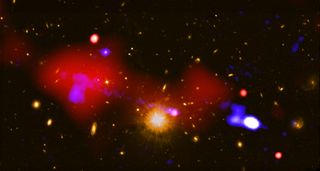 This composite image combines data from NASA's Chandra X-ray Observatory and the NSF's Karl Jansky Very Large Array (VLA). Chandra observed powerful X-rays (red) produced by hot gas circling around a black hole at the center of a galaxy located 9.9 billion light-years from Earth. The VLA was used to detect radio-wave emissions (blue) emitted by the jet of high-energy particles streaming from the black hole.