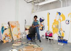 a black women in her art studio