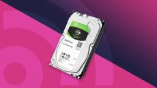 A SeaGate BarraCuda, one of the best hard drive picks, against a TechRadar background