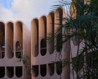 The Babel Tulum holiday apartment retreat is built from a plaster that closely resembles chukum (a traditional Mayan material), its earthy, pinkish colour adding a sense of softness