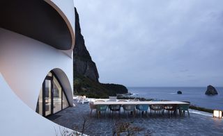 Outdoor eating space looking out onto the water