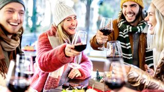 Friends having a drink outdoors