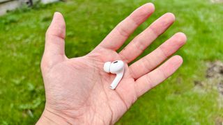 Apple AirPods Pro (2nd Generation) with single pod in palm