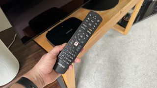 Humax Aura smart PVR remote being held