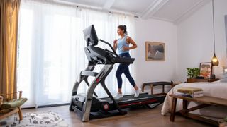 Woman running on the BowFlex Treadmill 22