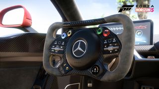 Official screenshot of Forza Horizon 5 depicting a car's steering wheel.