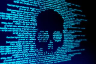 Stock image of a digital skull in code