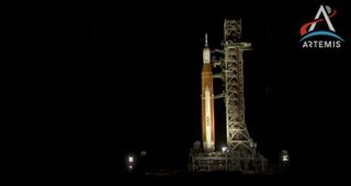 NASA's Artemis 1 moon rocket rolls off the Launch Pad 39B at Kennedy Space Center in Florida on Sept. 26, 2022, to take shelter from Hurricane Ian.