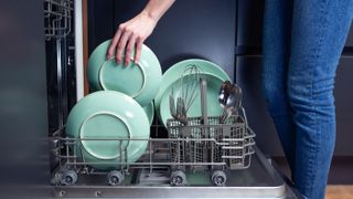 Dishwasher being loaded