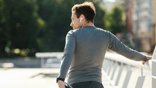 a photo of a man stretching