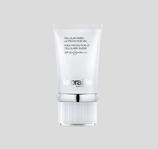 La Prairie Cellular Swiss UV Protection Veil white bottle