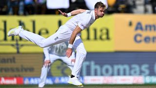 England's James Anderson delivers a ball during the first day of the fifth Test cricket match between India and England at the Himachal Pradesh Cricket Association Stadium in Dharamsala on March 7, 2024