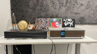 Ruark Audio R410 and Naim Mu-so 2 on table in test room