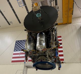 A view of the Lucy spacecraft near the end of its assembly showing off the large antenna it will use to communicate with Earth and measure the mass of each asteroid it flies past.