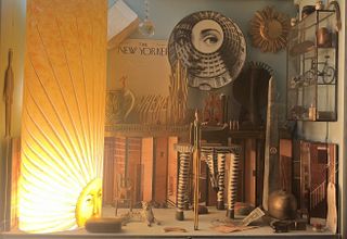 Barnaba Fornasetti desk with books and lights