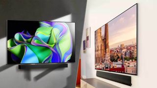 Best LG TVs: The LG C3 OLED vs the LG G3 OLED hanging on a wall.