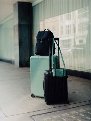 Rimowa luggage on street