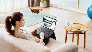 Woman using Acer Swift 5 laptop