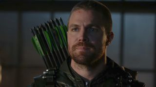 Screenshot of Oliver Queen close-up with arrow quill in Arrow