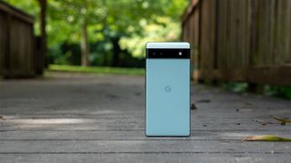 The back of the Google Pixel 6a on a bridge