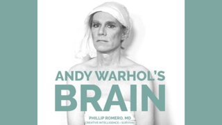 Section of book cover for 'Andy Warhol's Brain' by Dr Phillip Romero, showing black and white photograph of Andy Warhol, a slender white man with blond hair. The book title is written in sage green lettering.