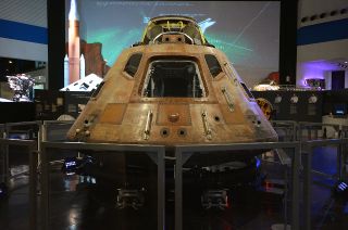 The Apollo 11 command module’s display as part of "Destination Moon" marks the first time Columbia has been exhibited outside of the Smithsonian in 46 years. The spacecraft is displayed without a cover, but within a perimeter just out of arm reach of the public.