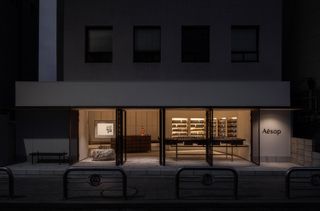 Aesop store exterior at night