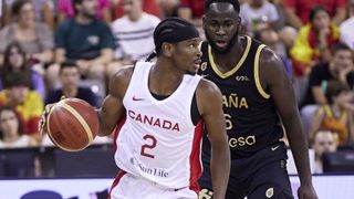 Shai Gilgeous-Alexander of the Canada Men&#039;s National Basketball Team dribbles the ball ahead of the Canada vs France FIBA Basketball World Cup clash. 