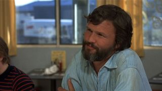 Kris Kristofferson sitting at a diner in Alice Doesn't Live Here Anymore