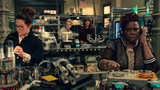 Melissa McCarthy, Kristen Wiig, Kate McKinnon and Leslie Jones in a lab at the end of Ghostbusters