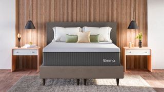 An Emma Hybrid Cooling Elite Mattress on a simple bed frame in a bedroom